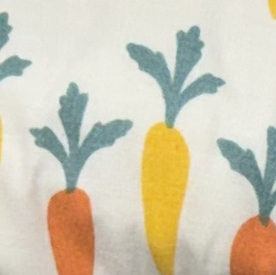 Pattern of colorful carrots on a white background
