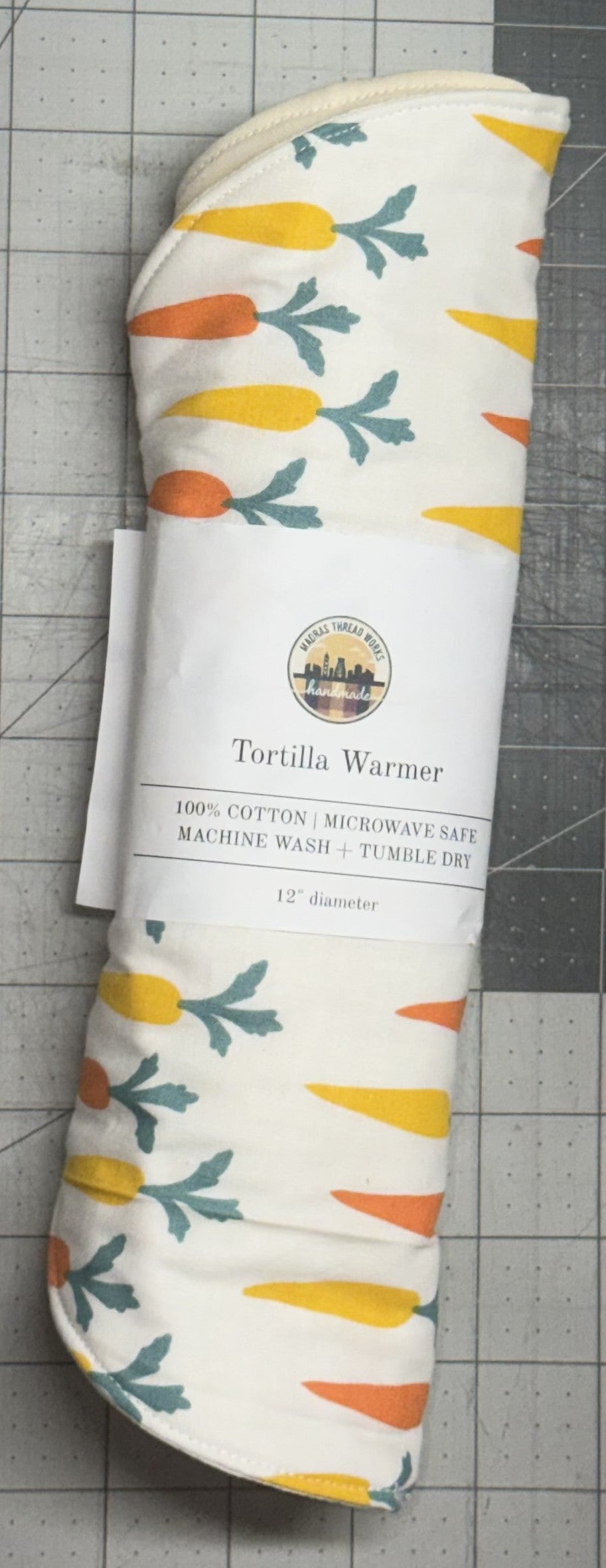 Tortilla warmer with carrot pattern on a white background