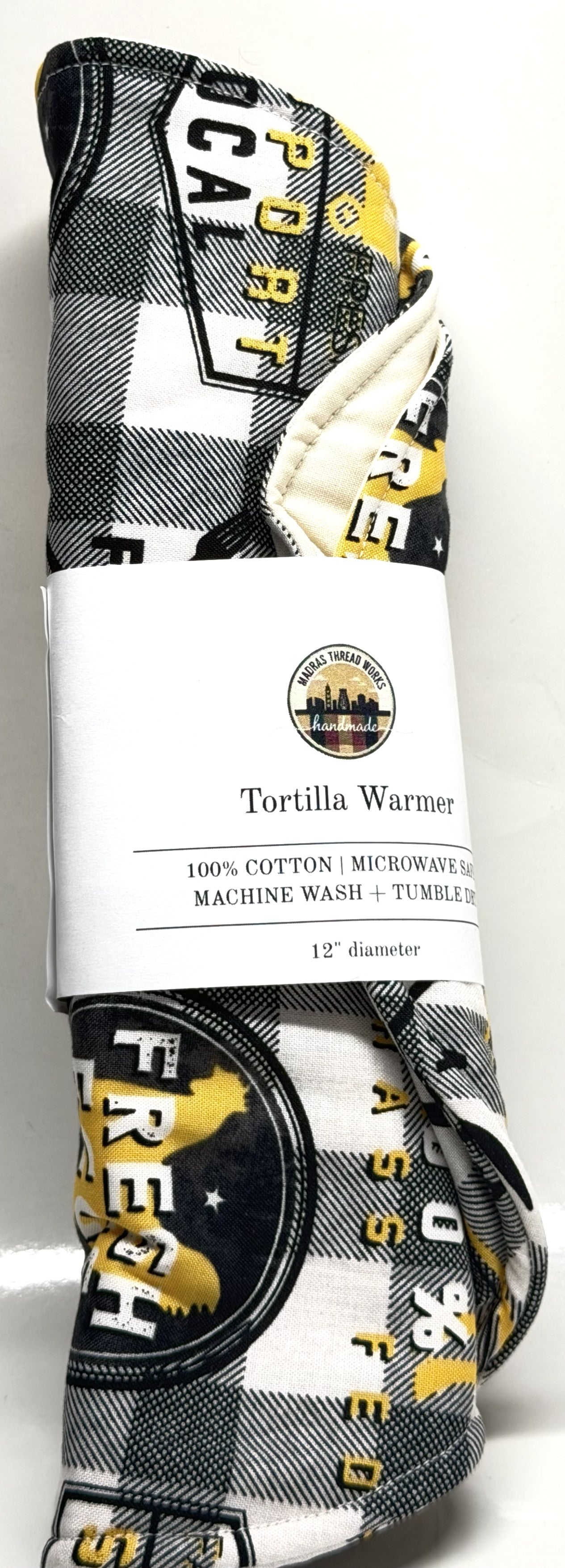 Checkered tortilla warmer with brand logo on a white background