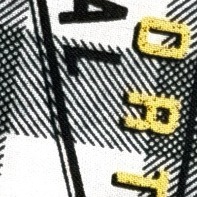 Fabric swatch showing black white and yellow checkered pattern