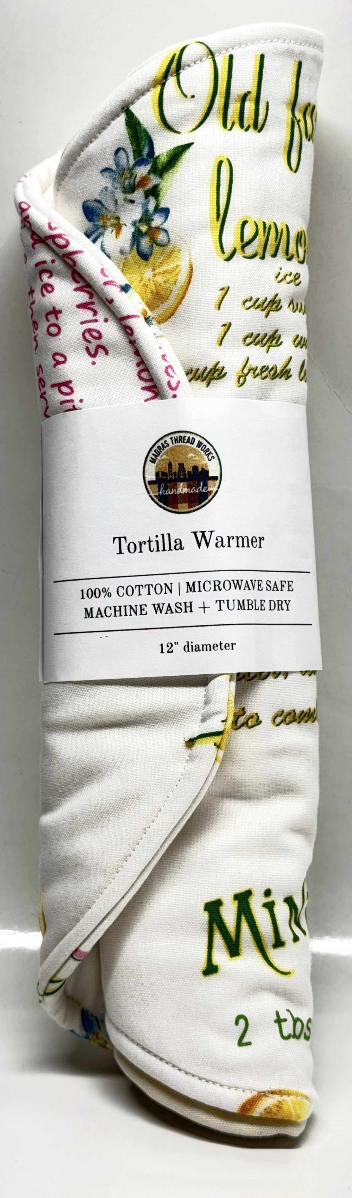 White tortilla warmer with text and graphics on a white background