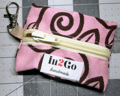 Mini trash bag dispenser